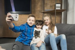 Page Idea: What Will Life Be Like 10 Years From Now? 1 Kids with a phone