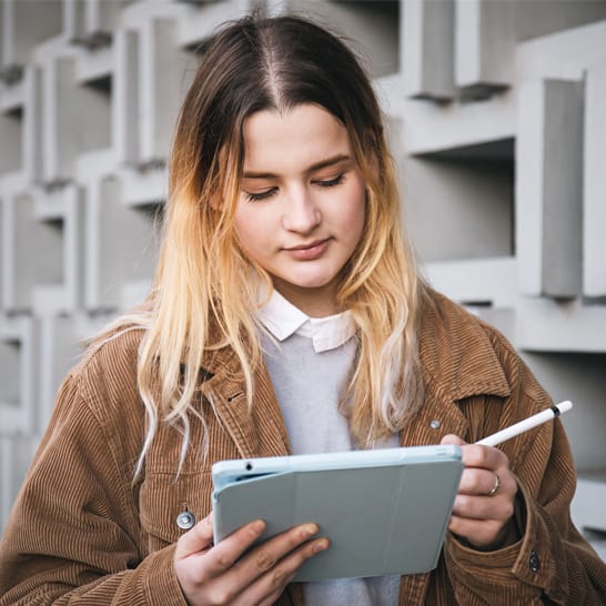 student using software to create yearbook